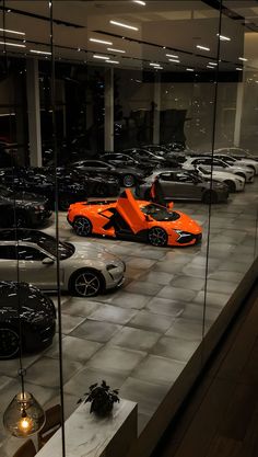 a car showroom filled with lots of cars