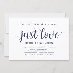 a white wedding card with the words just love on it, and black ink lettering