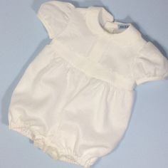 Linen Christening romper. Adorable white linen romper for boy. Lined bodice and romper. Perfect for Christening, Baptism, Wedding or any other special occassion. Front bodice with pin-tucks and waist detail. Short puffed sleeves. Peter pan collar...ric-rac trim to collar and waist. Button closure. Button closure to crutch for easy nappy/diaper changing. 6-12m Chest...29cm Length from shoulder to crutch...40cm 12-18m Chest...30.5cm Length from shoulder to crutch...42cm 18-24m Chest...33cm Length Cream Short Sleeve Bubble Romper For Summer, White Short Sleeve Bubble Romper For Baptism, Spring Baptism Cream Bubble Romper, Cotton Bubble Romper For Baptism In Summer, Off White Baptism Dress For Summer, Elegant White Bubble Romper For Spring, White Fitted Bubble Romper For Baptism, White Short Sleeve Bubble Romper For Summer, White Bubble Romper For Baptism In Summer