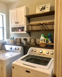 a washer and dryer in a small laundry room