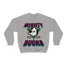 Flash back in time with this classic Anaheim Ducks throwback sweatshirt! Mighty Ducks Blanket, Duck Mask, The Mighty Ducks, Mighty Ducks, Quack Quack, Sandlot, The Sandlot, Duck Cloth, Anaheim Ducks