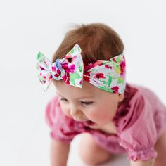 The PRINTED KNOT collection includes beautiful florals and modern patterns that will keep your babe the playground trendsetter. DETAILS: Limited seams on the headband means maximum stretch for ultimate comfort. Visible stitching adds detail and protects the integrity of the fabric; no holes were cut to turn the seams in. Add a printed bow to any outfit to showcase your strong sense of style. Novelty prints are sweet reminders of all your favorite memories. All prints are limited quantity, so gra Cute Spring Headband, Adjustable Elastic Headband For Spring, Adjustable Multicolor Hair Accessories For Spring, Spring Multicolor Adjustable Hair Accessories, Adjustable Headband For Spring, Casual Matching Headband Hair Accessories For Spring, Casual Hair Accessories With Matching Headband For Spring, Casual Spring Hair Accessories With Matching Headband, Playful Multicolor Hair Accessories With Matching Headband