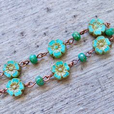 "I love the rich, warm colors of these turquoise beads. I think my favorite combination is with the copper (as shown), but if you are not a copper girl, the antique brass is just as nice. Sure to become a timeless part of your jewelry collection. Why not pick up the whole collection? The small bead is a 3 x 5mm teal bead. The flower bead is a beautiful 10mm, silky turquoise glass bead. All the beads are quality Czech glass beads. I offer them in both copper and antique brass. I am also offering Czech Beads Jewelry, Boho Jewelry Diy, Bead Tips, Diy Bracelet Designs, Turquoise Glass, Jewellery Ideas, Bracelet Beaded, Copper Bracelet, Flower Jewelry