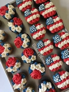 cupcakes with red, white and blue frosting in the shape of american flags