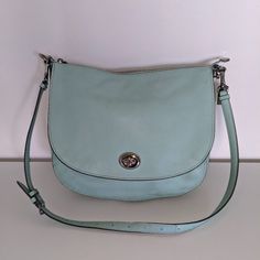 Cute Sea-Foam Colored Bag, Perfect For Spring. It Has Two One Large Compartment, And One Smaller Pocket In The Front Underneath The Cover. Dimensions Are 13" X 11". Comes With Two Straps For Use Over The Shoulder Or Cross Body. Bags Coach, Seafoam Green, Sea Foam, Coach Bags, Cross Body, Leather Bag, Blue Green, Bag Lady, Mint