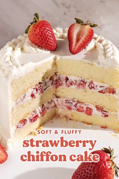 a white cake with strawberries on top and one slice cut out from the cake