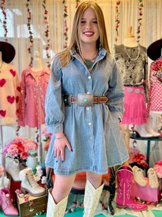 "Get ready to rock this Sweetheart Denim Dress! Made with soft denim and featuring a knee length hem, this dress is perfect for a casual or dressed-up look. With silver flat buttons, a flowy fit, puff sleeves, and a collared neckline, it's sure to become your go-to outfit. (Sorry, cowboy boots not included!)" Spring Knee-length Denim Dress With Snap Buttons, Spring Snap Button-up Denim Dress, Denim Dress With Cowbiy Boots, Blue Button-up Denim Dress With Button Closure, Chic Denim Mini Dress With Button-up Front, Silver Flats, Cowboy Boots, Puff Sleeve, Denim Dress