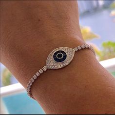 Gorgeous Evil Eye Bracelet White Gold Plated High Quality And Adjustable Elegant White Evil Eye Bracelet Gift, Elegant White Evil Eye Bracelet, Elegant White Round Evil Eye Bracelet, Adjustable White Tennis Bracelet As Gift, Adjustable White Tennis Bracelet Bangle, Adjustable White Tennis Bangle Bracelet, Adjustable White Tennis Bracelet, White Round Tennis Bracelet For Party, Elegant Silver Adjustable Evil Eye Bracelet