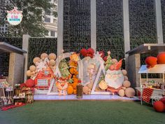 an outdoor display with balloons and decorations