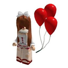 a lego girl holding two red balloons in her hand and standing next to the balloon