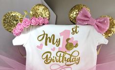 a pink and gold minnie mouse birthday outfit