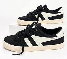 Based on an original style from 1975 that was worn by tennis player, Mark Cox, this ladies' tennis-inspired plimsoll features an  off-white upper, contrasting wing flash, and signature Gola branding. From Gola. Ladies Tennis, Tennis Player, Tennis Players, Sneakers Fashion, Fashion Shoes, Tennis, Flash, Lace Up, Off White