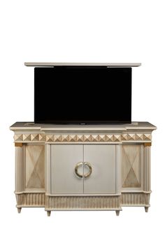 an entertainment center with a flat screen tv on top of it's sideboard