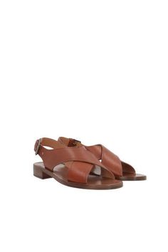 Church's flat sandals crafted in tan-colored smooth leather. Featuring adjustable ankle strap with metal buckle, a round-toe silhouette, leather lining and leather sole.Gender: WOMENMaterial: 100%CALFColor: BROWNMade in: ITProduct ID: DX01049FGF0ACW*Import tax/duty will be calculated at checkout (If applicable) Calf Leather Sandals With Tang Buckle, Calf Leather Sandals With Tang Buckle And Open Heel, Classic Leather Flat Slingback Sandals, Leather Slingback Sandals With Round Toe And Tang Buckle, Brown Summer Footbed Sandals With Tang Buckle, Summer Brown Footbed Sandals With Tang Buckle, Brown Tang Buckle Sandals For Spring, Spring Calf Leather Sandals With Tang Buckle, Brown Sandals With Tang Buckle For Spring