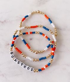 The perfect set of three for Astros fans! You can choose between gold plated or gold-filled beads for your set of three. Houston Astros Bracelet, Adjustable Gold Beaded Bracelets For Game Day, Astros Outfit Woman, Astros Bracelet, Baseball Astros, Big Sister Bracelet, Selling Ideas, Mother Daughter Bracelets, Mini Bracelet