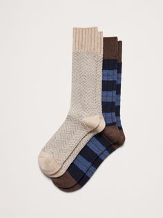 This sock is knitted from our best-selling blend of beautiful Merino wool and modal, which adds softness and a smooth finish.  Temperature Regulating Sustainability: Made with TENCEL™ modal, sourced from European beechwood trees, harvested from sustainably managed forests.  Set of 2 pairs.  Fits men's shoe sizes 8-12. Classic Fall Cashmere Socks, Party Sale, Men's Shoe, Knit Stitch, Men Shoes Size, Mens Socks, Mens Fitness, Merino Wool, Banana Republic