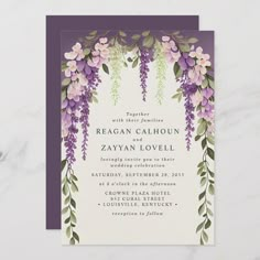 a wedding card with purple flowers and greenery