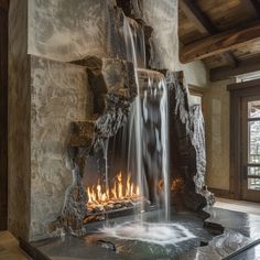 a fire place in the middle of a room with a waterfall coming out of it