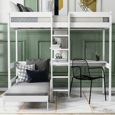 a white bunk bed sitting next to a desk and chair