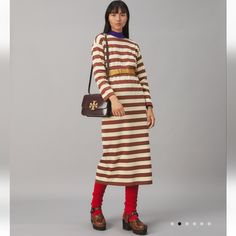 Tory Reinterprets American Luxury, Channeled Through The Attitude Of Classic New York. This Season, The Striped T-Shirt Is Recast As A Long Dress In Softly Structured Cotton. Roomy Sleeves With Drop Shoulders Are A Nod To Seventies Sportswear. Wear It With Or Without The Matching Belt And Style It In An Unexpected Way: Layered Over A Knit Dickie In A Pop Of Color. 100% Cotton Jersey Side Pockets At Hips Single Serif T Logo On Shoulder Removable Matching Belt With Adjustable D-Ring Closure Style Mockneck Dress, Casual Formal Dresses, Tory Burch Dress, Cocktail Formal, Flannel Dress, Ribbed Sweater Dress, Tie Dye Dress, Dyed Dress, Turtle Neck Dress