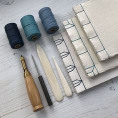 the tools are laid out on the table to be used in crafts and quilting