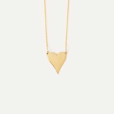 Presenting an exquisite Long Heart Necklace in 14K Gold. This dainty heart pendant necklace is a symbol of love and elegance, perfect for everyday wear. The 14k real gold jewelry is an ideal gift for her, showcasing timeless design and exceptional quality. This stunning piece can be a beautiful expression of affection for a special woman in your life. Make her feel special with this sparkling piece of jewelry that shines as brightly as she does. 14k solid gold handcrafted pieces 100% ethical sou Minimalist 14k Gold Necklace For Valentine's Day, Minimalist Yellow Gold Necklace For Valentine's Day, 14k Gold Heart Necklace With Delicate Chain For Anniversary, Minimalist 14k Gold Double Heart Necklace, Minimalist 14k Rose Gold Heart Necklace, Delicate 14k Gold Necklace For Valentine's Day, Minimalist 14k Gold Open Heart Charm Necklace, Rose Gold 14k Gold Heart Necklace For Her, 14k Yellow Gold Heart Necklace With Delicate Chain