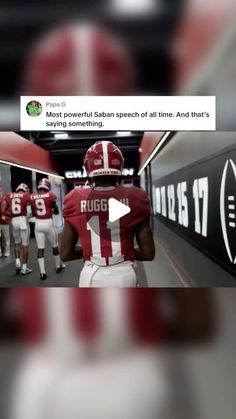 an image of a football team walking down the tunnel