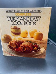 a cookbook on the cover of a recipe book for better homes and gardens complete quick and easy cookbook