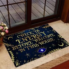 a blue door mat with an image of the words energy before you come in this house