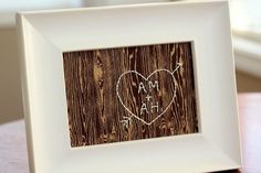 a white frame with a heart drawn on it