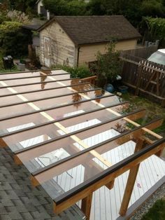 an overhead view of a wooden deck with glass panels on it's top and bottom