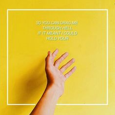 a person's hand reaching up against a yellow background with the words, so you can drag me through hell if it meant to hold your