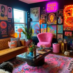 a living room filled with lots of colorful furniture and art on the wall behind it