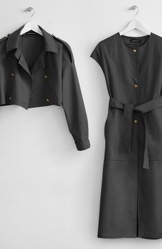 Fabric: 100% CottonColor: BlackCare: Machine Wash Cold/ Tumble Dry Low Two-piece long nude trench coat (44-45 inches (112-115cm long)) with belt and two front pockets. The length of jacket is 16 inches (40-42cm). Unlined. Made in USA. Khaki Mini Dress, Khaki Trench Coat, Black Trench Coat, Hooded Trench Coat, Iranian Women Fashion, Trench Dress, Hijabi Fashion Casual, Modesty Fashion, Trench Coat Black