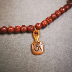 "❤This beautiful bone carved mala clip pendant is hand carved by Tibetan craftsmen from Tibet in 2000's.   From Hepo Town, Baiyu County, the birthplace of the famous Tibetan handicrafts. It is entirely hand-carved,the shape is alphabet means OM Tibet. You can use it as a mala pendant, or a separate necklace pendant,or keychain. ❤These amazing bone beads are handcrafted by artisans from Tibet,who recycle and reuse everything in daily life and spiritual practice. Bone carvings symbolize reincarnat Tibetan Alphabet, Alphabet Meaning, Tibetan Yak, Bead Accessories, Nothing Is Permanent, Buddhist Teachings, Tout Est Possible, Bone Color, Water Buffalo