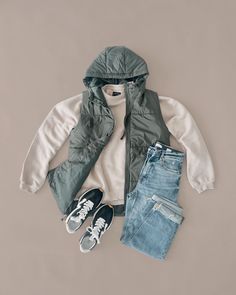 Featured in this OOTD is the Loa Crew by Lily & Lottie, Caleb Hooded Puffer Vest, Edan Eunina Dad Jean, and the Steve Madden Campo Sneaker. Hooded Puffer Vest, Dad Jeans, Puffer Vest, Cold Day, Stay Warm, Warm And Cozy, Snug Fit, Steve Madden, Puffer