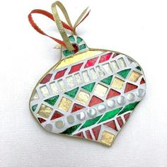 a christmas ornament hanging on a white background