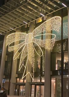 a building with lights in the shape of a butterfly