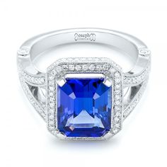 a blue sapphire and diamond ring set in white gold