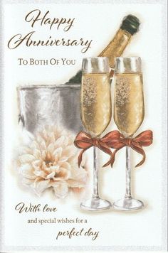 an anniversary card with two champagne glasses and a bottle