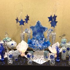 a table with blue and white decorations on it