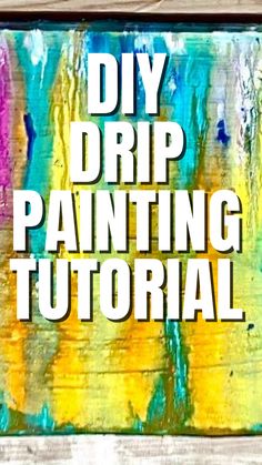 the words diy drip painting on a wooden background