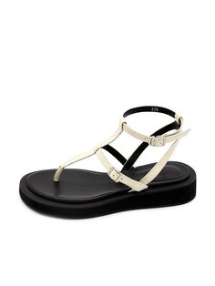 Editor's NotesThe comfortable flat sandals will go with every summer outfit- Stylish slim straps- Double T shape strap silhouette- Buckled straps at the upper and ankle to tightly hold the feet- Thong style sandals- Bold and lightweight platform sole- Natural rubber sole prevents slipping and renders soft fittingMeasurements(in.)KR 220mm - KR 255mm- Heel height 1.2 in.- Fits true to the size- If you are wearing between sizes, please select a larger one.Composition & Care- Cow skin- After wea Summer T-strap Sandals With Adjustable Ankle Strap, Summer T-strap Toe Post Sandals With Adjustable Strap, Cream Toe Post Sandals For Summer, Summer T-strap Slingback Sandals With Adjustable Strap, Beige Ankle Strap T-strap Sandals For Summer, Summer T-strap Sandals With Buckle Closure, Summer T-strap Sandals With Strap Details, Summer T-strap Sandals With Adjustable Straps For Beach, Summer Beach T-strap Sandals With Adjustable Straps