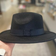 This product is available for in-store pick up only. Urban or rural, formal or casual, this 100% wool Felt Hat can be worn anywhere and everywhere! Our versatile, in-house design comes in five stunning colors, so you are sure to find one that you love. Our Felt Hat comfortably fits heads measuring 22" to 23.5", and is ethically made in a factory where workers are provided dignified work and wages. Felt Hat, Wool Felt, Pick Up, In Store, Felt, House Design, Wool, Hats, Black