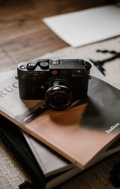 a camera sitting on top of a book