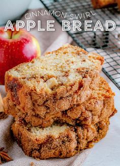 cinnamon swirl apple bread stacked on top of each other with an apple in the background