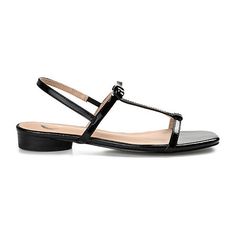 A sleek look for summer, the Zaidda by Journee Collection. This T-strap sandal features soft vegan leather and a padded insole for the perfect fit. A retro slingback strap and bow accent finish the design for an elevated finish.Closure Type: Pull OnShoe Heel Height: 1 InchUpper/Outer Base Material: 100% PolyuretheneShoe Lining Material: PolyurethaneSole Material Content: 100% PolyurethaneToe Type: Open ToeShoe Strap Type: Slingback StrapHeel Style: Block HeelCountry of Origin: Imported Elegant Flat Sandals With Adjustable Strap, Flat Sandals With Buckle Closure For Evening, Elegant T-strap Synthetic Sandals, Elegant Synthetic T-strap Sandals, Chic Flat T-strap Sandals With Heel Strap, Spring Evening T-strap Toe Post Sandals, Sleek Black T-strap Sandals, Sleek Open Toe Sandals With Buckle Closure, Spring Evening T-strap Sandals