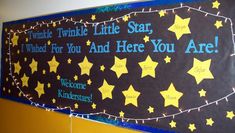 a bulletin board with stars on it in a classroom setting for children to learn how to read and write