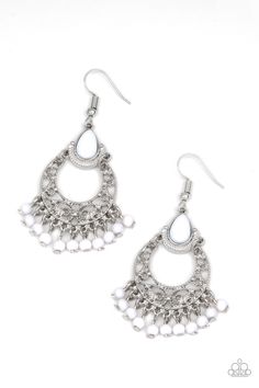 Infused with a white beaded fringe, an ornate silver half moon frame swings from the bottom of a teardrop white bead for a whimsical flair. Earring attaches to standard fishhook fitting.

Sold as one pair of earrings. Moon Frame, Wedding Bridal Jewellery, Fish Hook Earrings, Paparazzi Accessories, Exclusive Jewelry, Beaded Fringe, Paparazzi Jewelry, White Earrings, Fringe Earrings