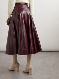 Find BOTTEGA VENETA Pleated Glossed-leather Midi Skirt on Editorialist. Leather is central to what Bottega Veneta does, and the quality of the hide used for this skirt really sings. Buttery soft and with a glossed finish, it's paneled in a circle silhouette, so it moves beautifully as you walk. Circle Silhouette, Flat Dress Shoes, Leather Midi Skirt, Dress Flats, A Circle, Everyday Wardrobe, David Yurman, Jil Sander, Jeans Dress